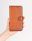 iPhone 16 Pro Max case in leather with RFID, tan, lifestyle