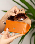 Leather glasses case, tan, lifestyle view