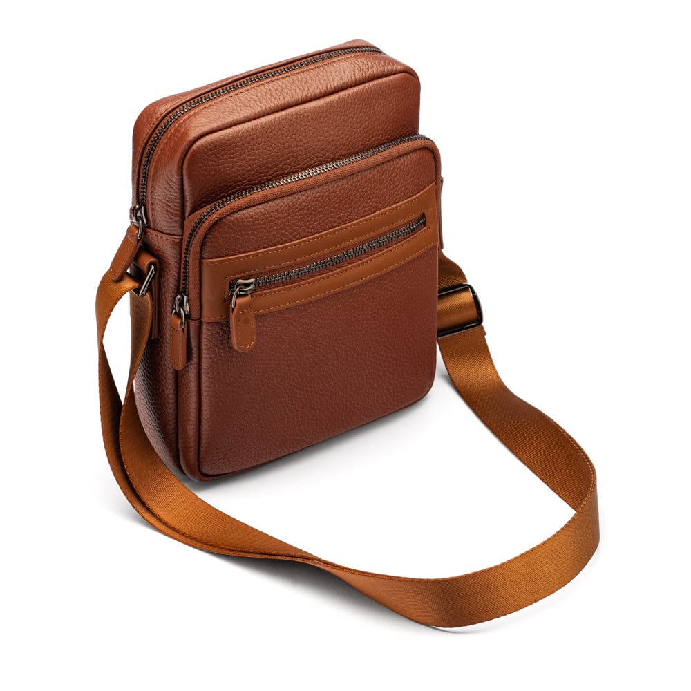 Leather messenger bag with zip, tan, side view