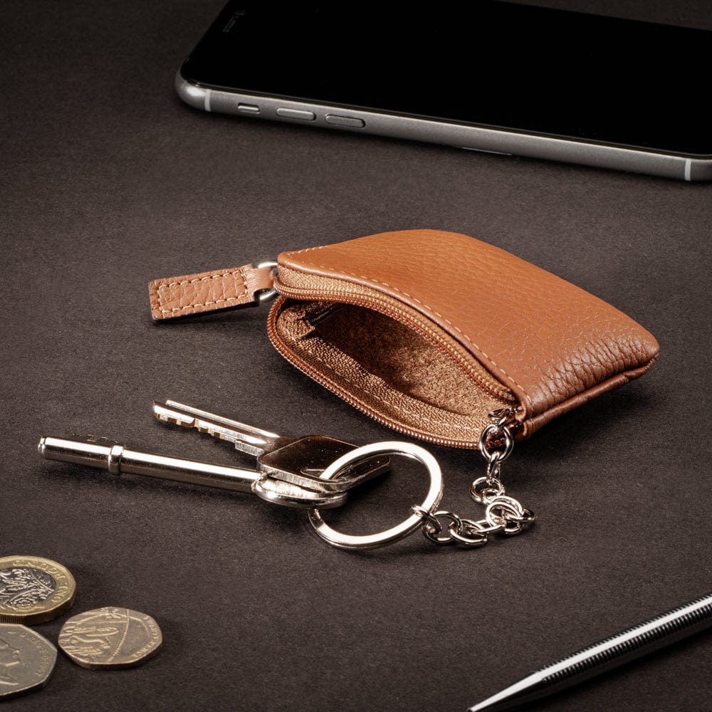 Miniature leather coin purse with key chain, tan, lifestyle