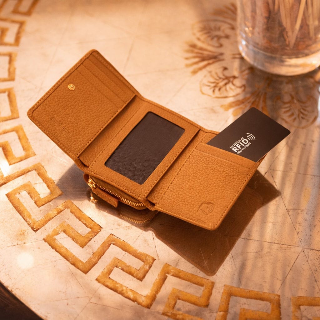 RFID blocking leather tri-fold purse, tan, lifestyle view