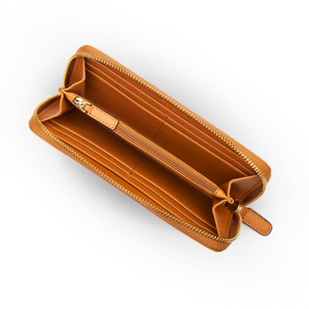 Tall leather zip around accordion purse,  tan, inside