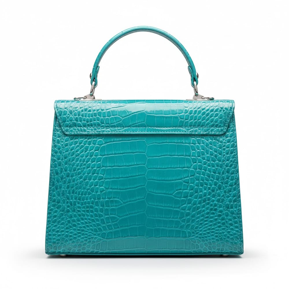 Leather Catherine top handle bag, turquoise patent croc, back