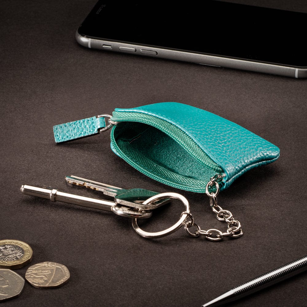 Miniature leather coin purse with key chain, turquoise, lifestyle