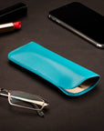 Small leather glasses case, soft turquoise, lifestyle