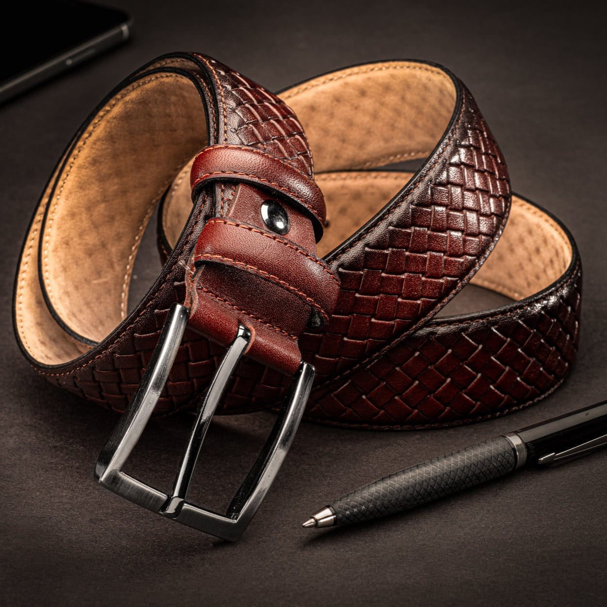 Woven leather belt for men, burnished dark tan, lifestyle