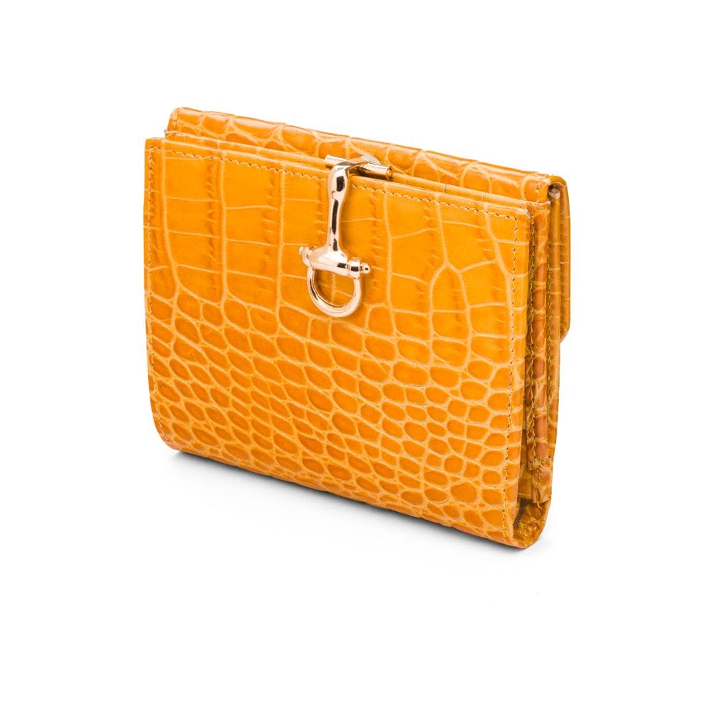 Leather purse with brass clasp, yellow croc, front view