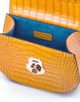 Leather rounded bottom top handle bag, yellow croc, inside