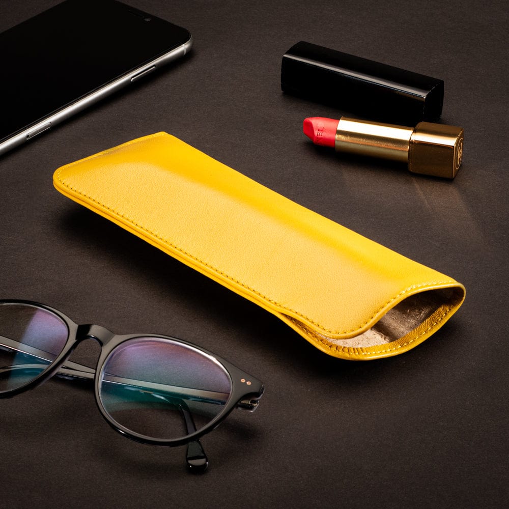 Large leather glasses case. soft yellow, lifestyle
