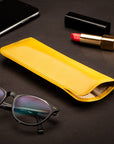 Large leather glasses case. soft yellow, lifestyle