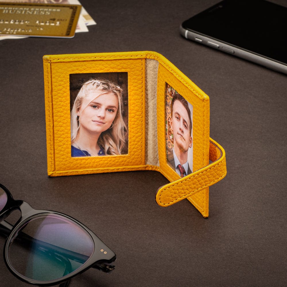 Mini leather passport photo frame, yellow 60 x 40mm, lifestyle