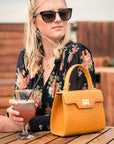 Mini Morgan bag, yellow ostrich, lifestyle