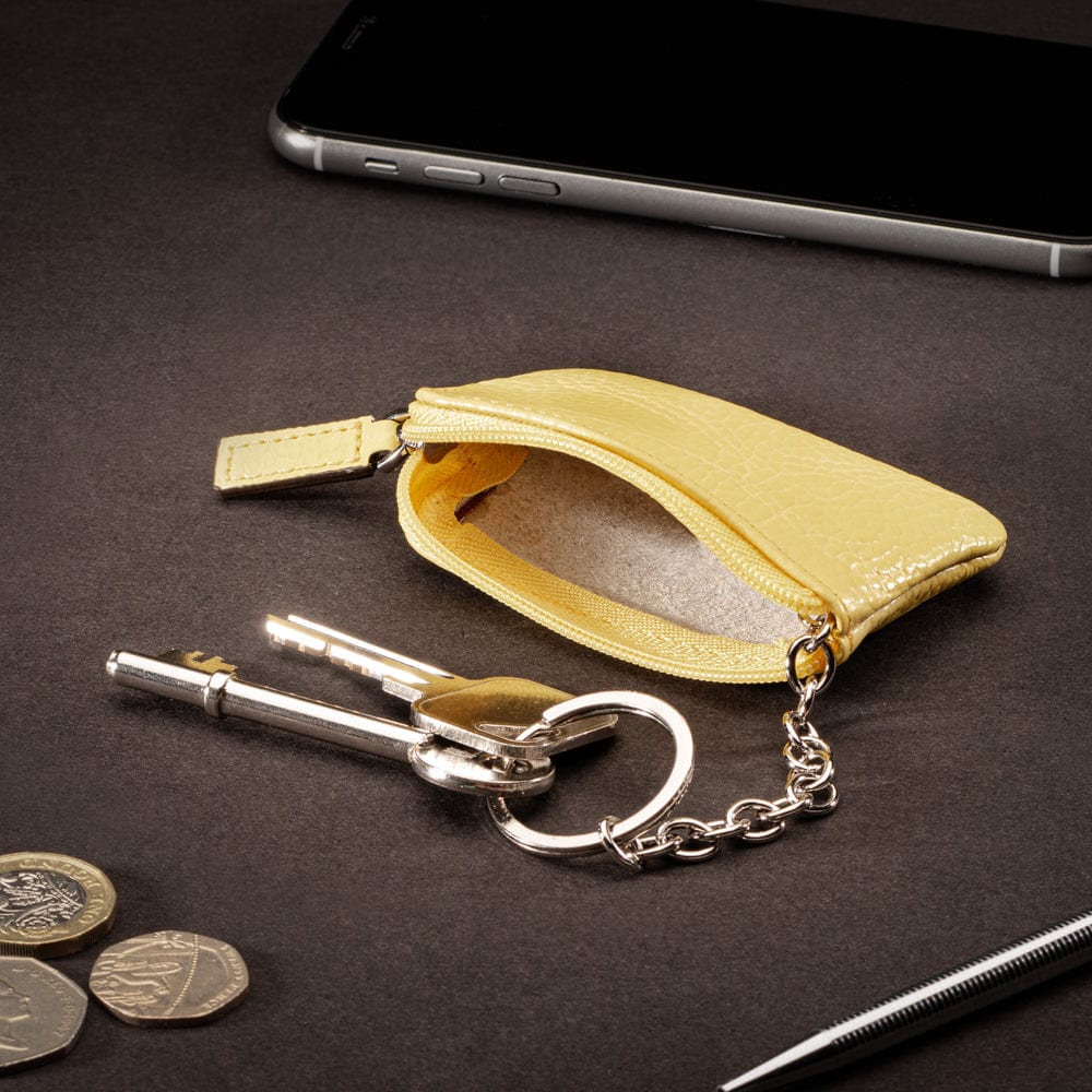 Miniature leather coin purse with key chain, yellow, lifestyle