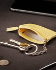 Miniature leather coin purse with key chain, yellow, lifestyle