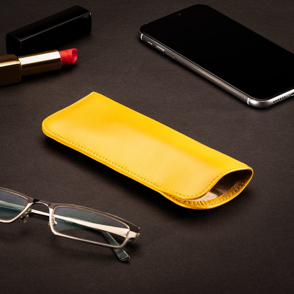 Small leather glasses case, soft yellow, lifestyle
