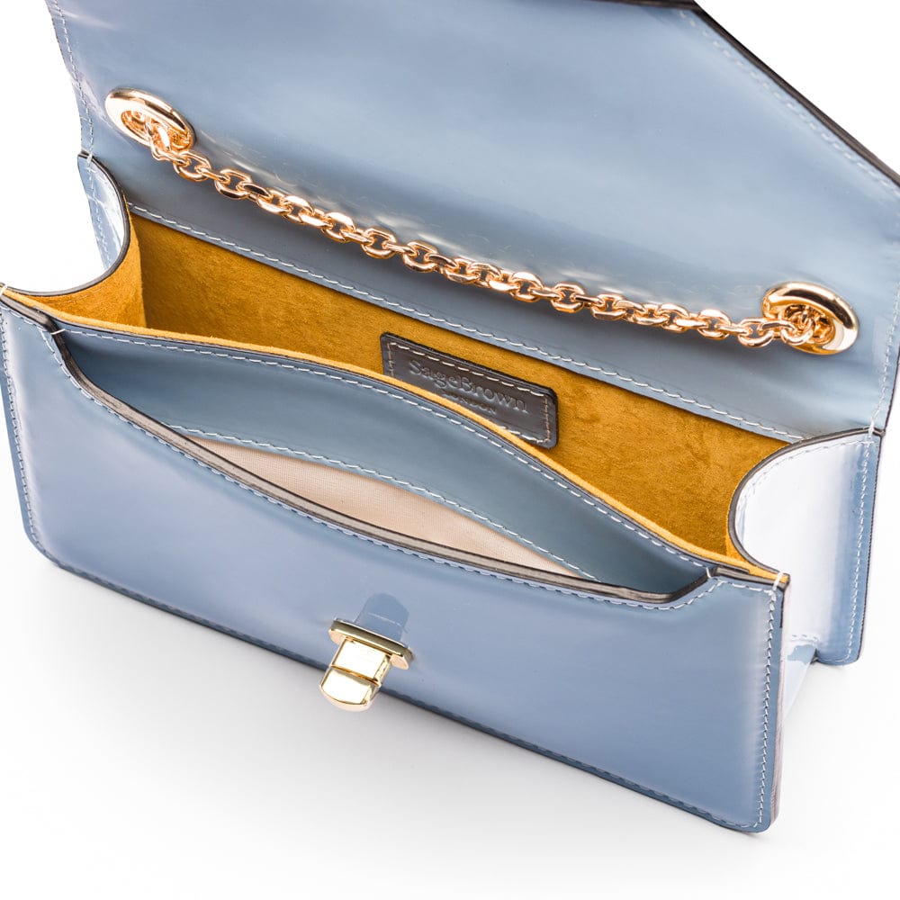Small leather envelope chain bag, baby blue patent, inside