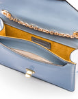 Small leather envelope chain bag, baby blue patent, inside