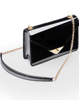 Small leather envelope chain bag, black patent, side view