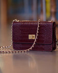 Small leather chain bag, burgundy croc, lifestyle