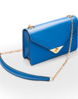 Small leather envelope chain bag, cobalt, side view