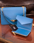 Mini leather chain envelope bag, cobalt, lifestyle view