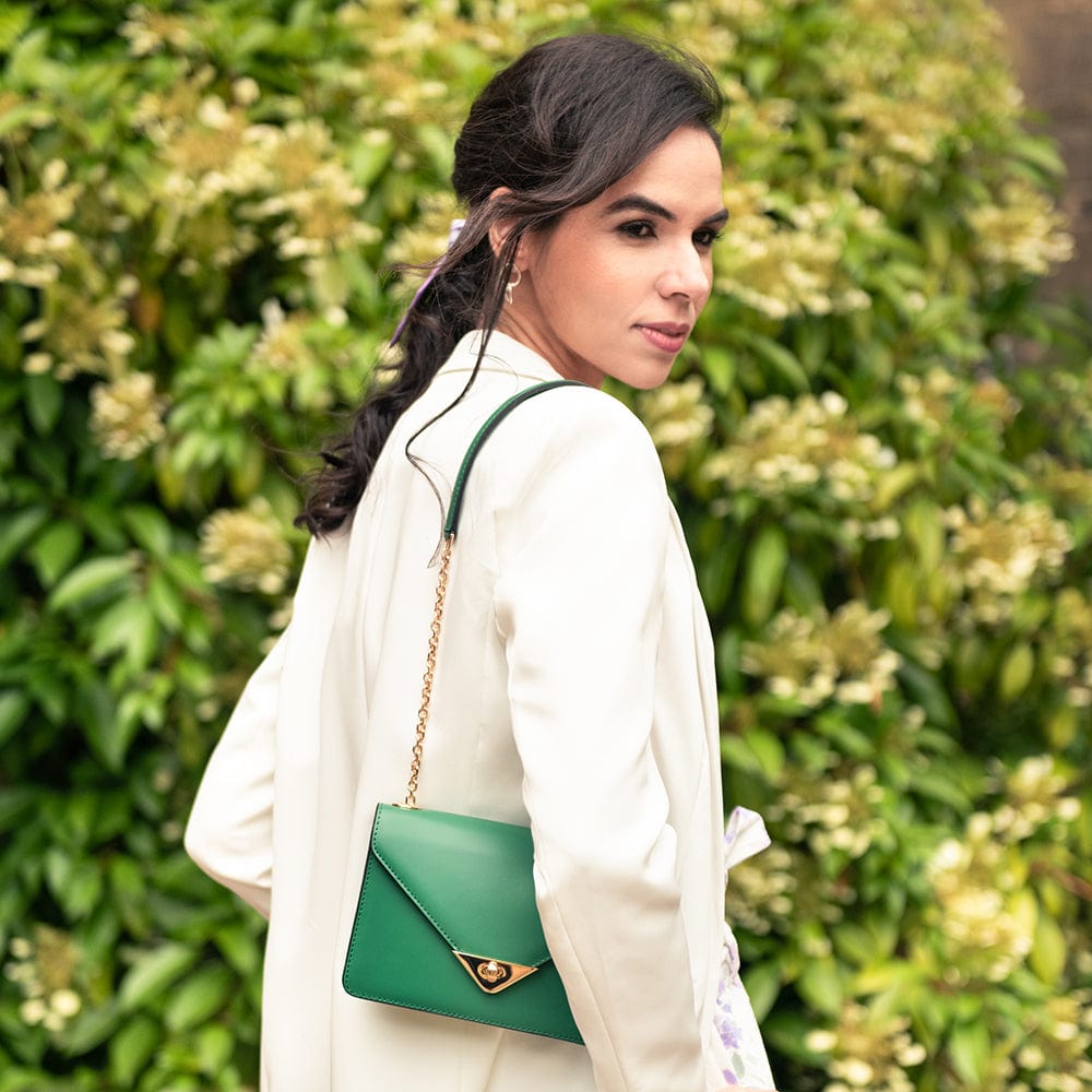 Small leather envelope chain bag, emerald, lifestyle view