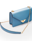 Small leather envelope chain bag, light blue, side view