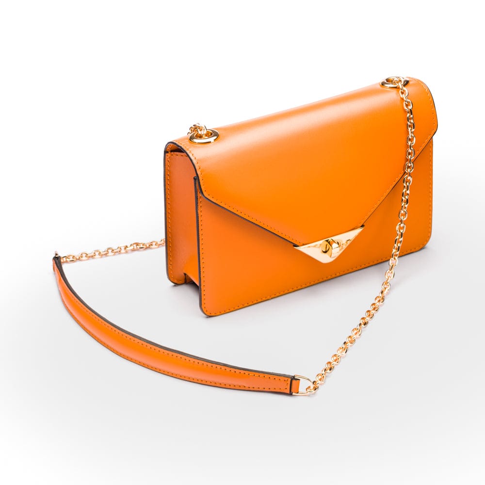 Small leather envelope chain bag, orange, side view