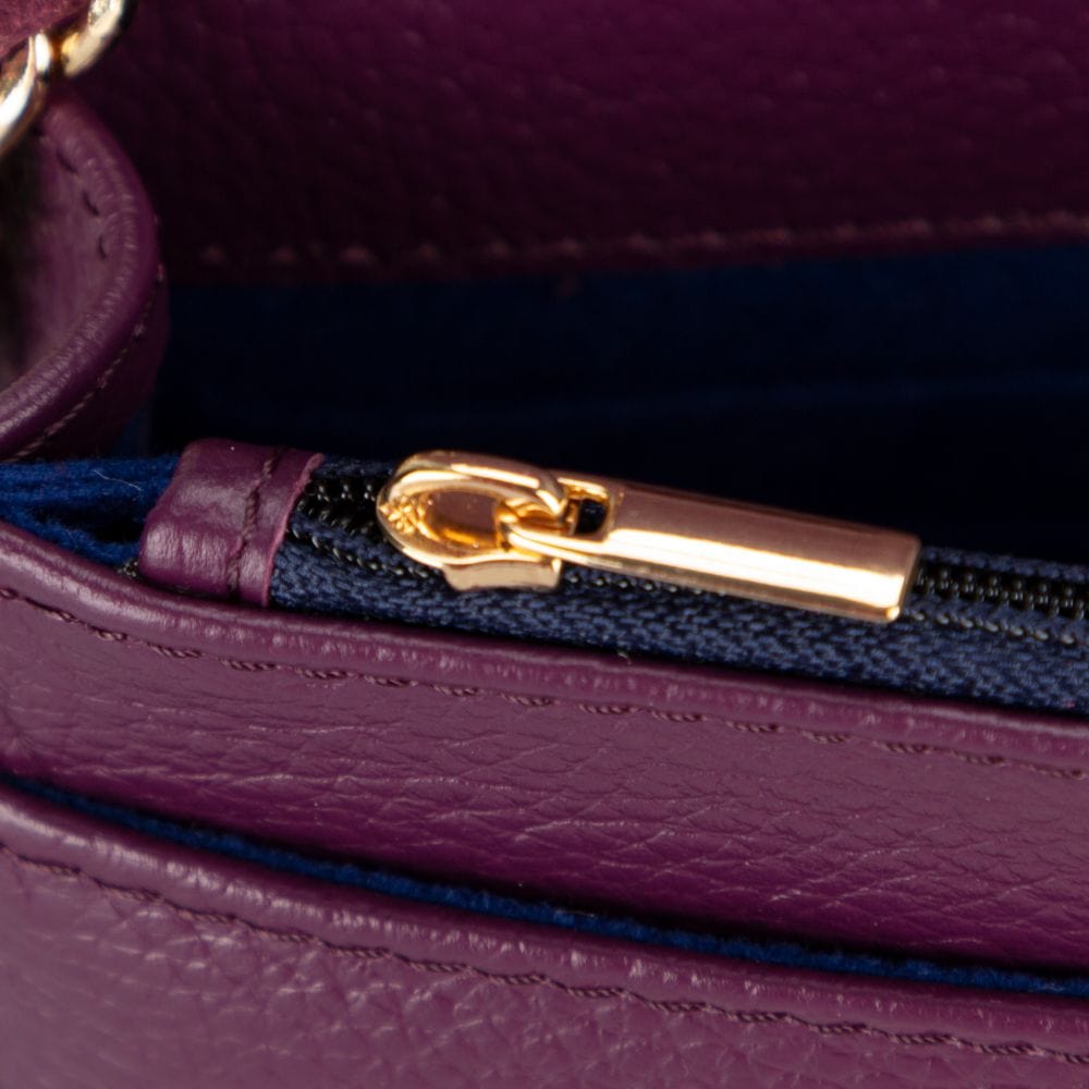 Small leather chain bag, purple, close up