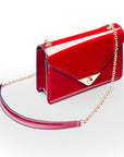 Small leather envelope chain bag, red patent, side view