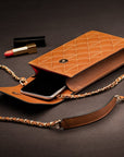 Leather phone bag, tan, lifestyle