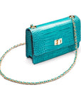 Mini chain bag, turquoise croc, side view