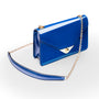 Small leather envelope chain bag, cobalt patent, side view