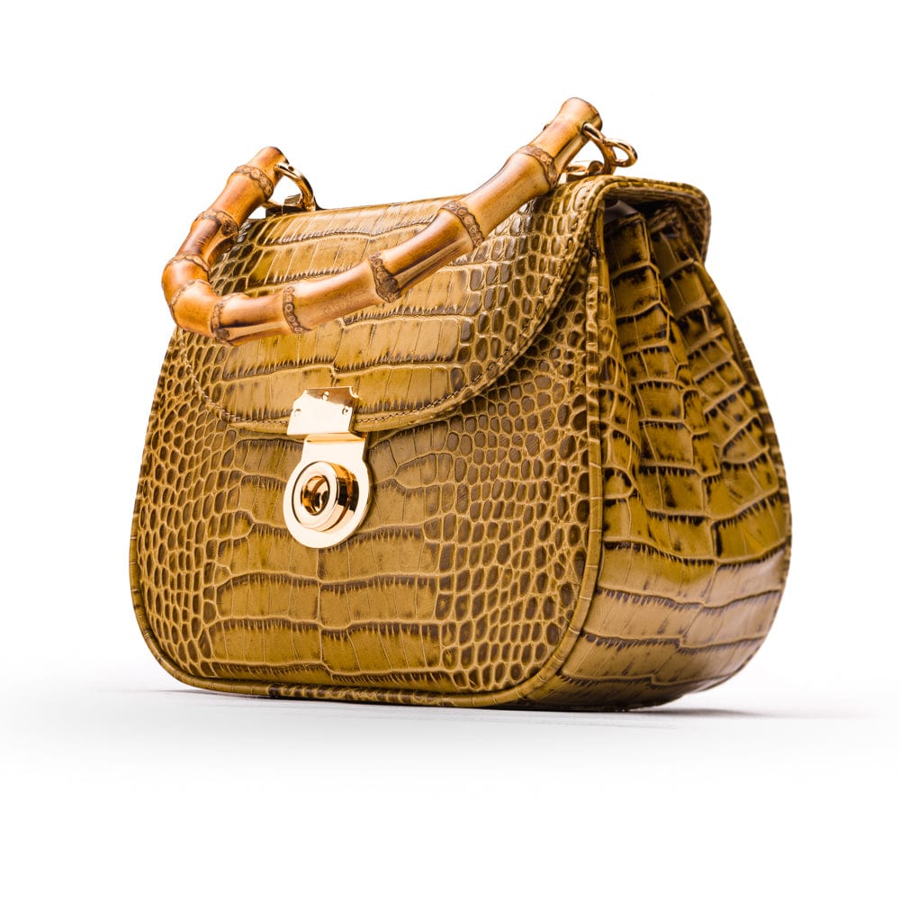 Bamboo handle bag, antique green croc, side view