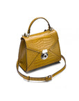 Mini Burnett small top handle bag, antique green croc, side view