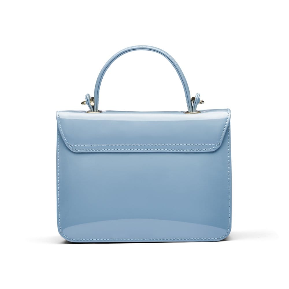 Small leather top handle bag, patent baby blue, back