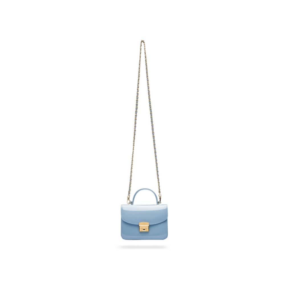 Small leather top handle bag, patent baby blue