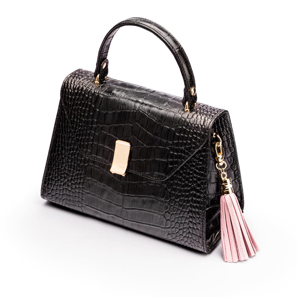 Decorative leather tassel, baby pink, on a bag