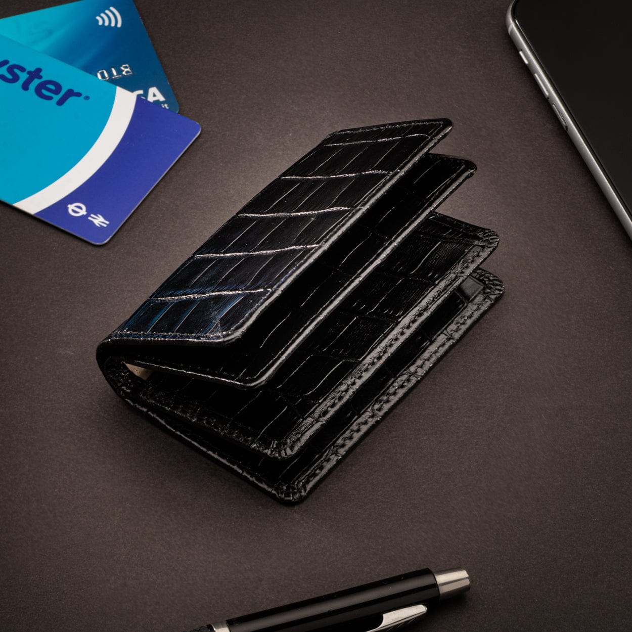 Leather bifold card wallet, black croc, lifestyle