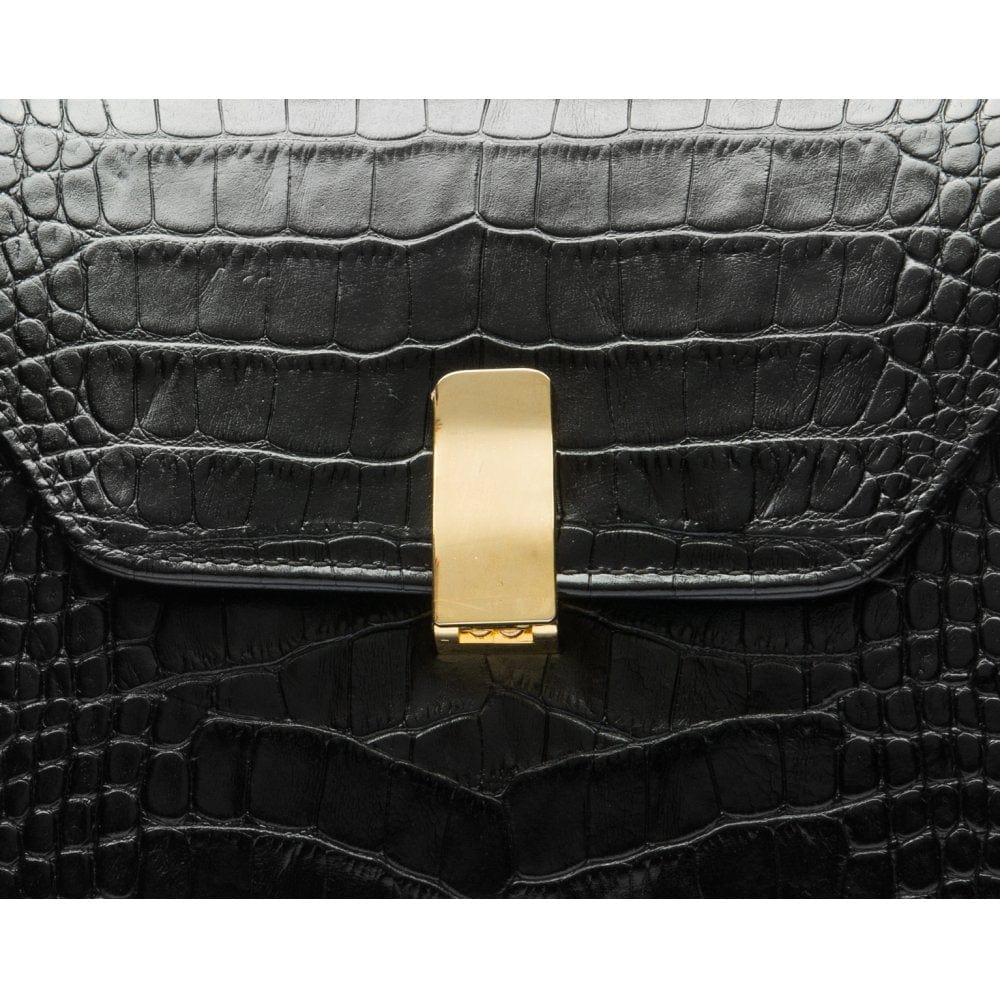 Leather top handle bag, black croc, lock close up