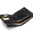 Leather purse with brass clasp, black croc, inside