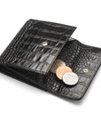 Leather purse with brass clasp, black croc, open