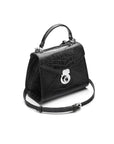 Mini Burnett small top handle bag, black croc, side view