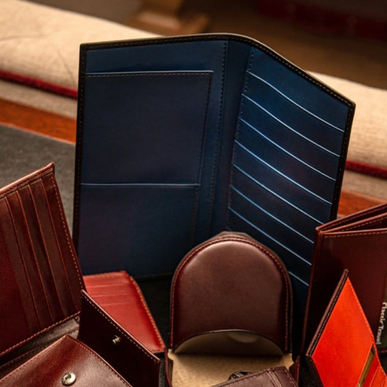 Slim tall leather suit wallet, black croc with cobalt, lifestyle
