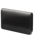 Leather business card holder with magnetic closure, black with red, front