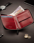 Men's leather zip wallet with coin purse, black with red, lifestyle