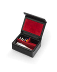 Small leather accessory box, black with red, open