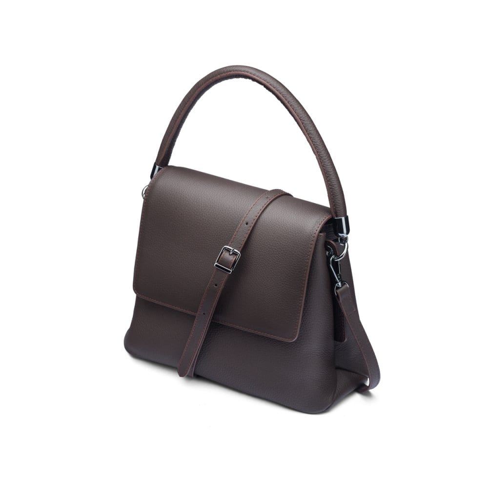 Leather handbag with flap over lid, brown, side view