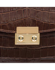 Small leather top handle bag, brown croc, lock close up