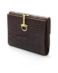 Leather purse with brass clasp, brown croc, front view